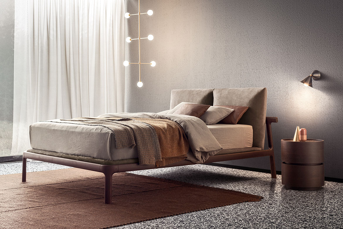 camera da letto moderna di design italiano letto in legno con testiera imbottita in tessuto sfoderabile design Philippe Tabet per Pianca, comodino rotondo componibile