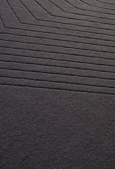 tappeto moderno in pura lana vergine 100% naturale con disegni geometrici realizzato in italia